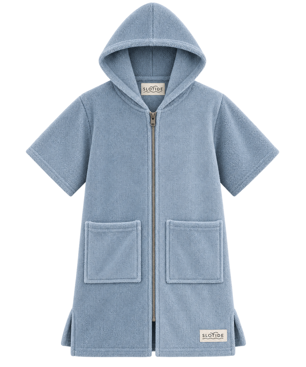 A light blue hooded zip-up towel robe with short sleeves, two front patch pockets, and a small visible SLOFTUB brand label, shown on a plain white background.
