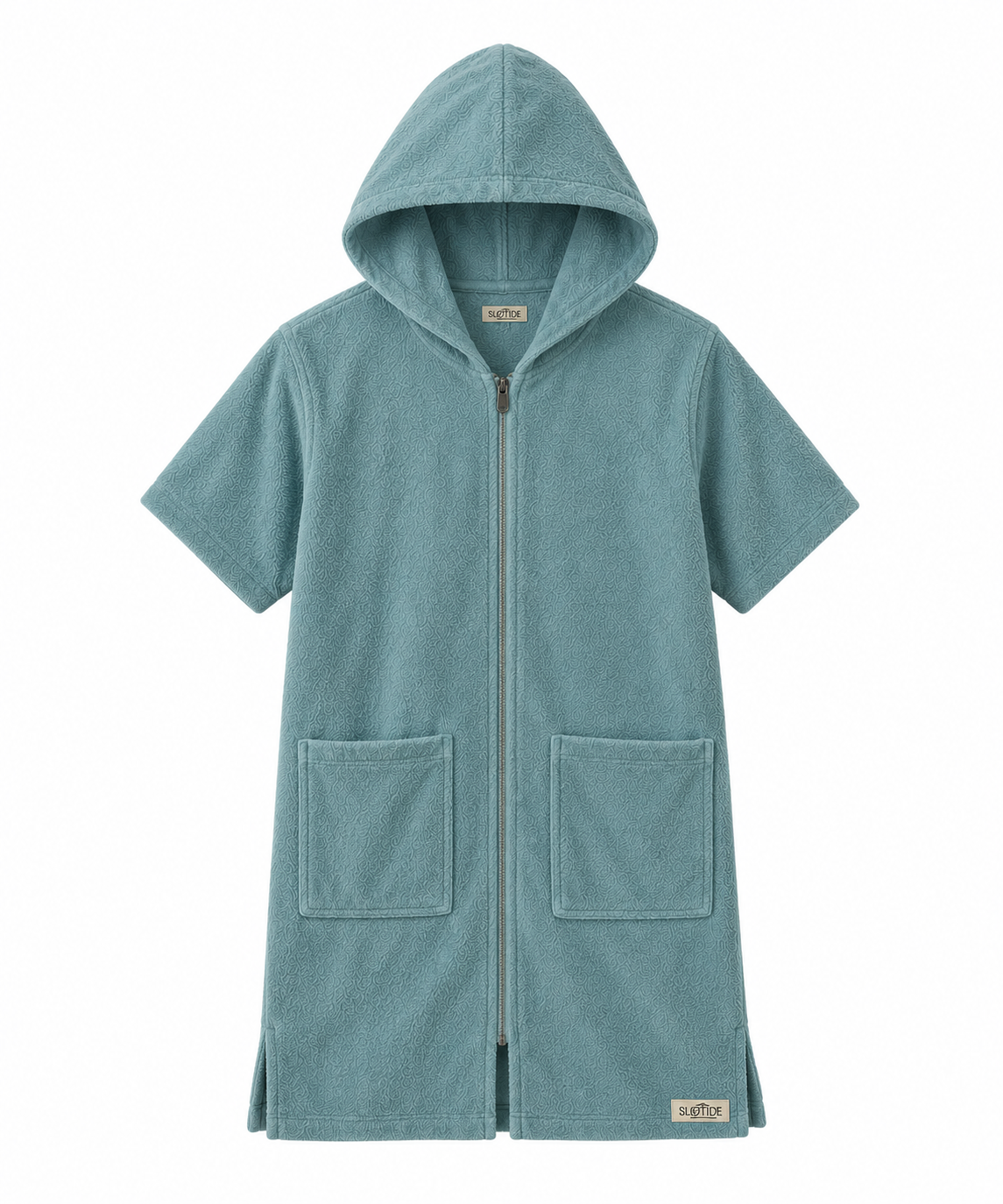 A short-sleeved hooded towel robe in a dusty teal blue-green color, featuring a front zipper, two large front patch pockets, and a small brand label near the bottom hem.